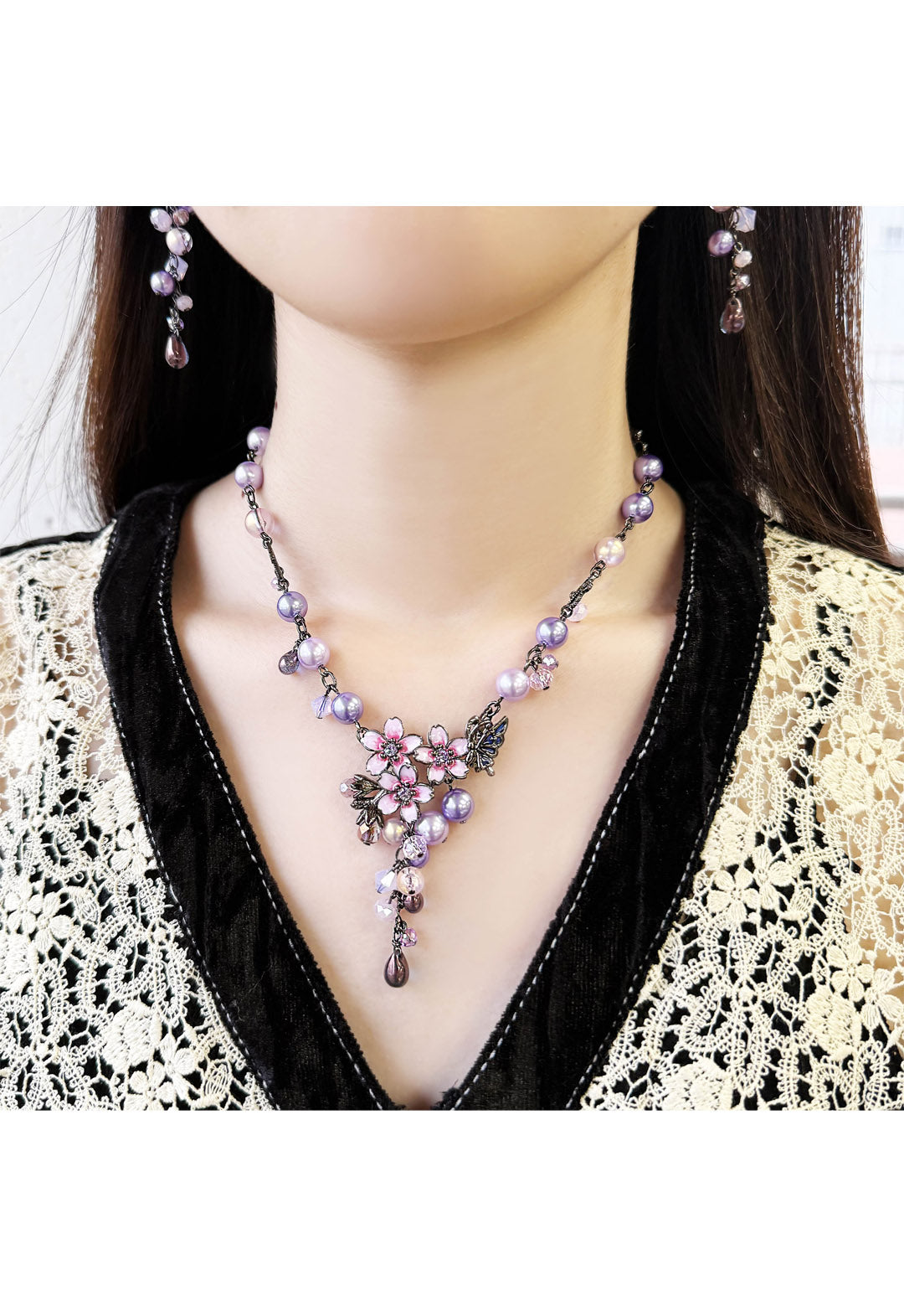 Night cherry blossom and butterfly motif necklace