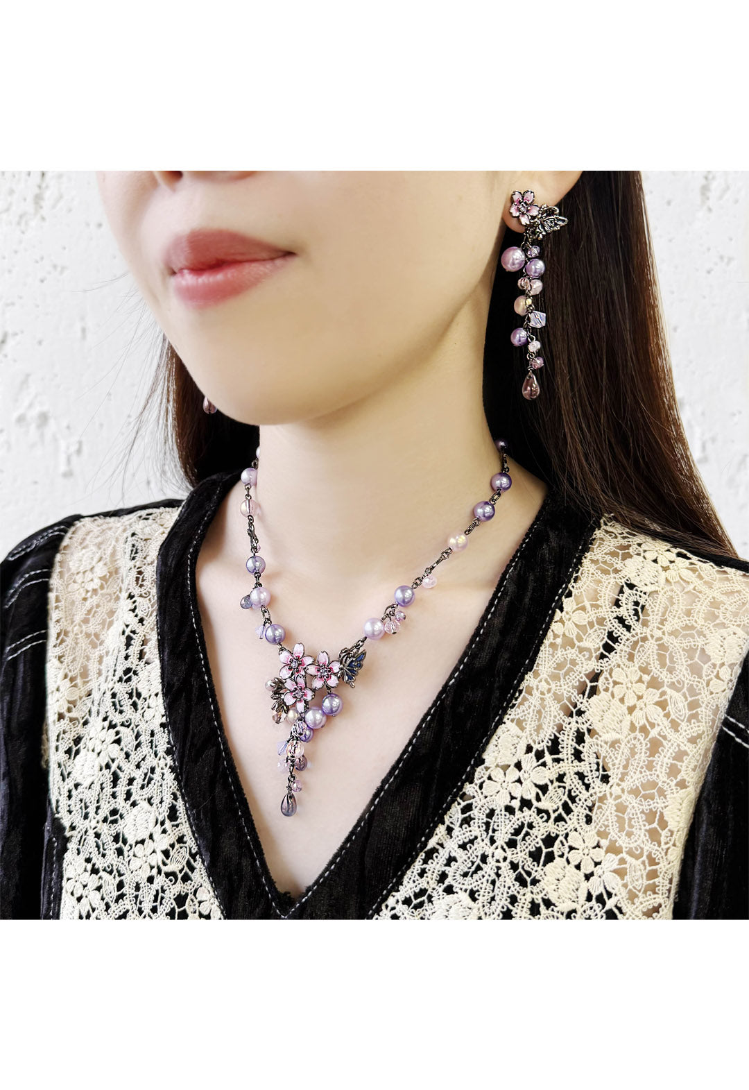 Night cherry blossom and butterfly motif necklace