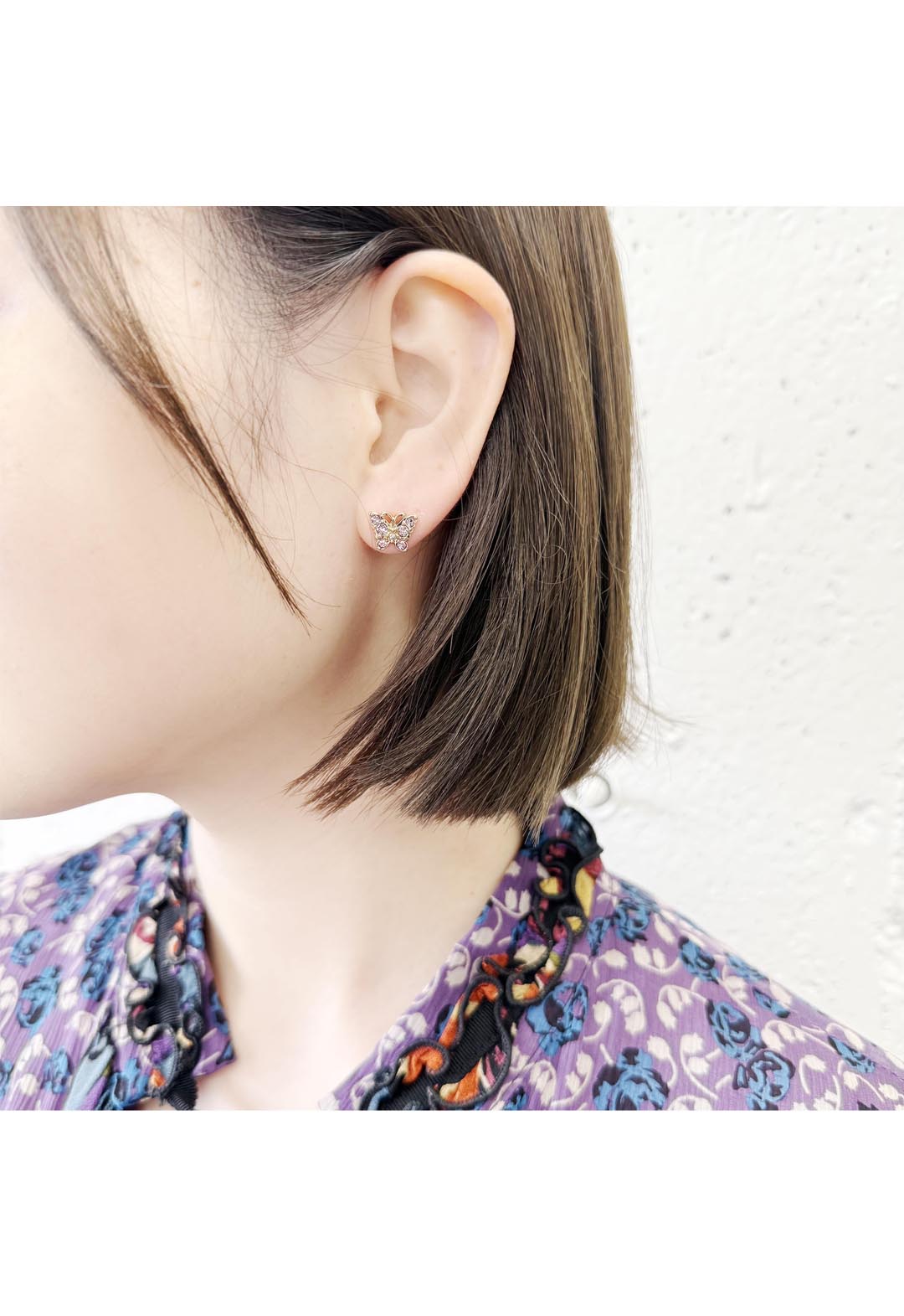 Butterfly motif earrings