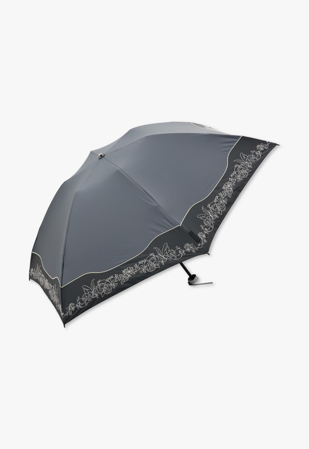 Cut-and-sew embroidered folding umbrella for all weather use