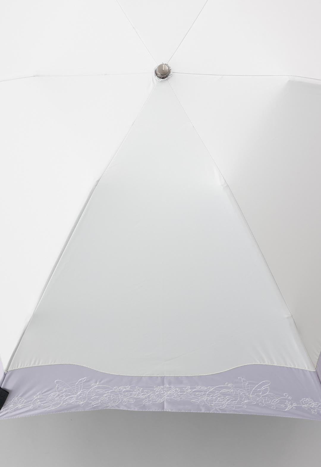 Cut-and-sew embroidered folding umbrella for all weather use