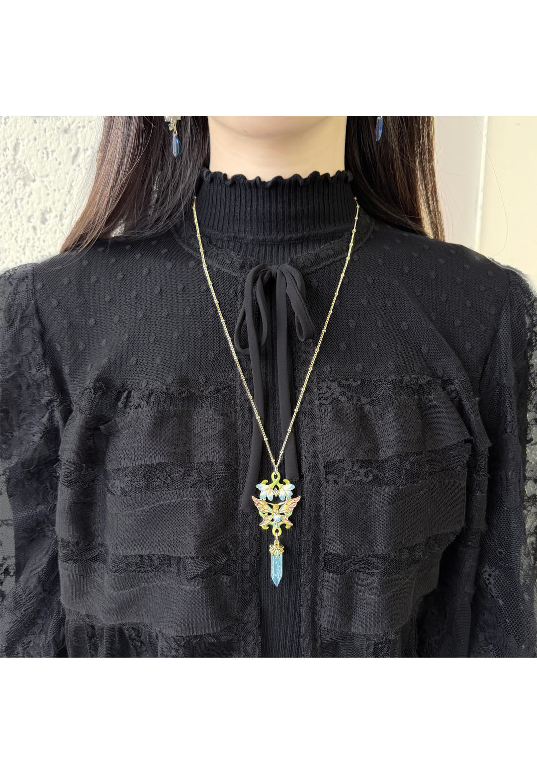 Fairy and snowdrop motif necklace
