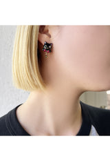 Titi motif earrings