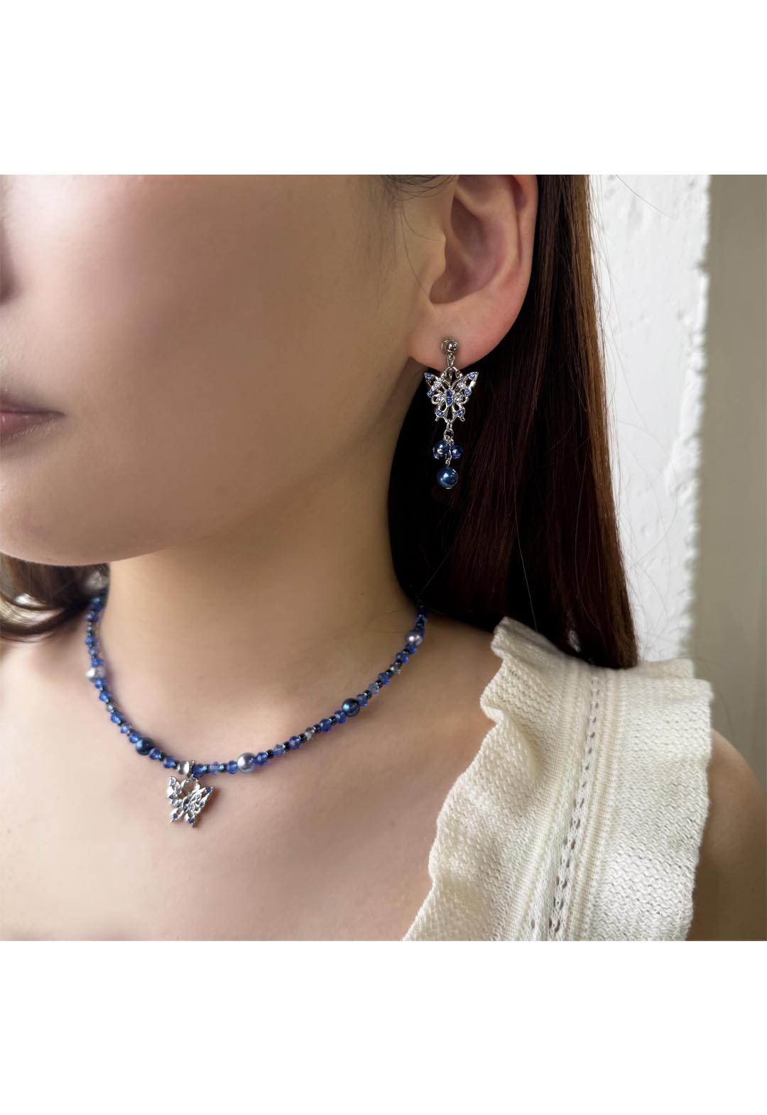 Butterfly motif earrings