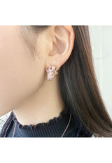 Mini pig motif earrings