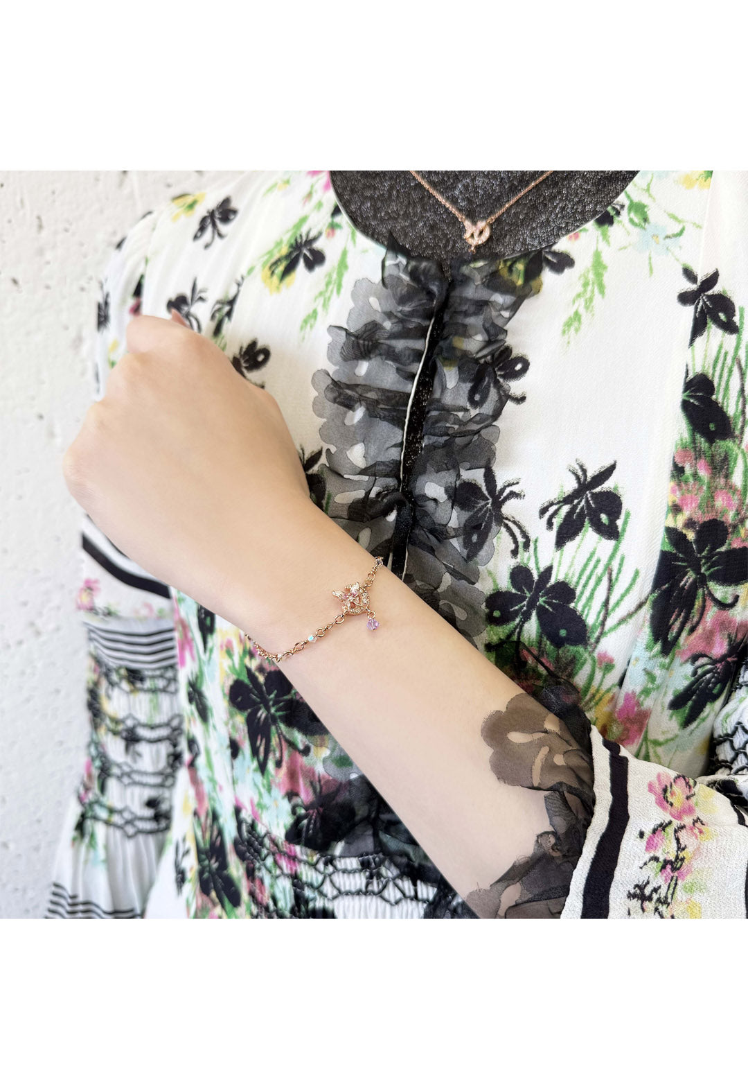Butterfly and crescent moon motif bracelet