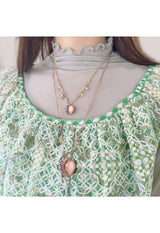 Peach motif necklace