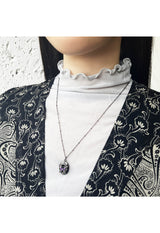 Butterfly motif rocket necklace