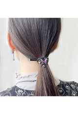 Butterfly motif pony