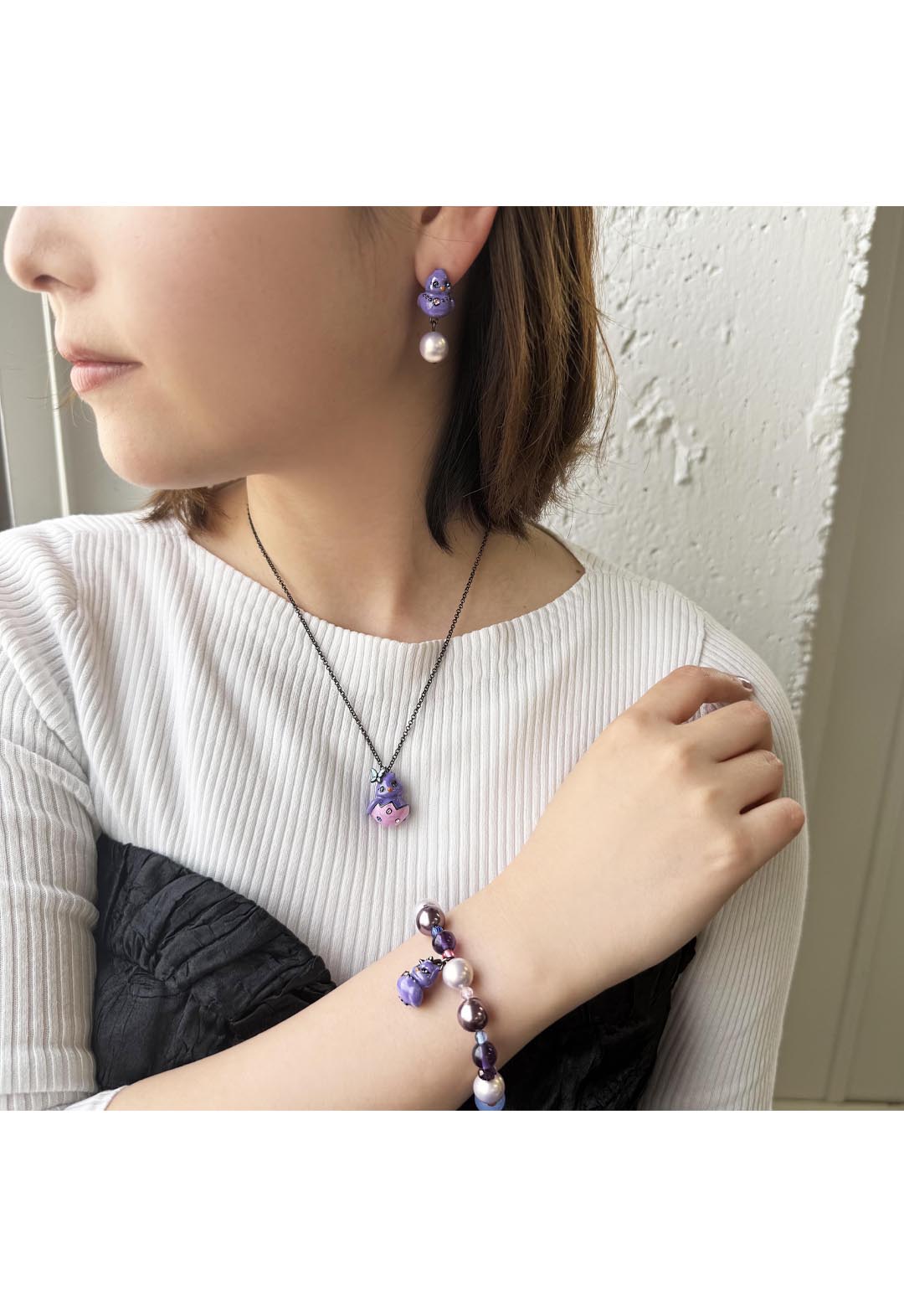 Chick motif necklace