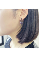 Butterfly key motif earring