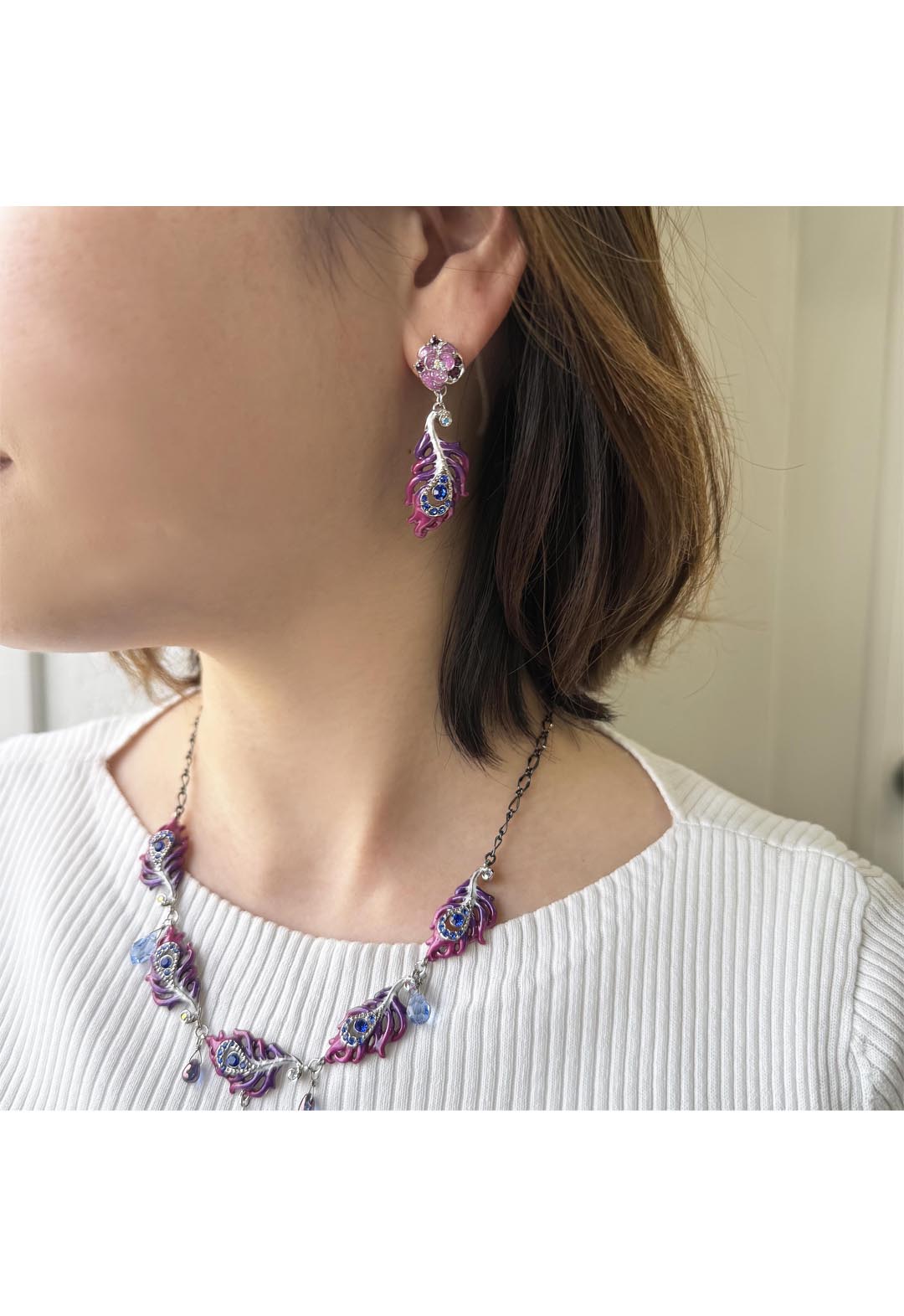 Phoenix motif earrings